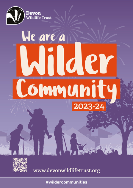 Wilder Communities Award plaque which is purple with a silhouette of people in nature and fireworks with the text 'We are a Wilder Community 2023-24' over the top