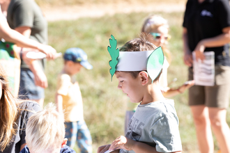 Child with leaf crown