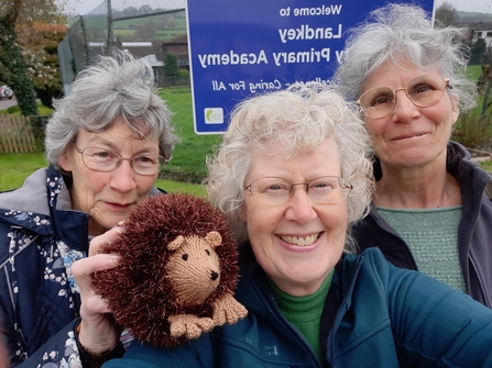 Landkey Hedgehog Group members with a toy hedgehog