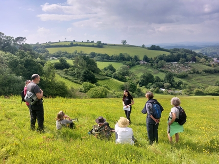 Project leader, Claire Inglis, guides a group of local visitors around the site of the new temperate rainforest